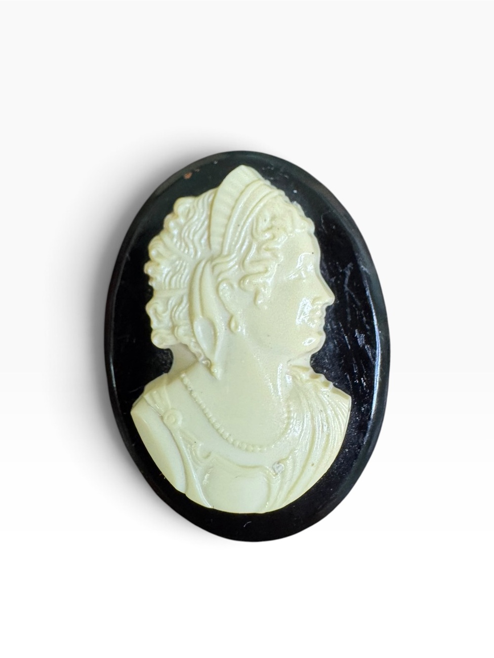 Vintage Black and Cream Plastic Cameo Brooch - Women's Jewelry